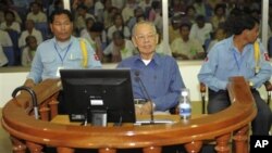 Ieng Sary, center, former Khmer Rouge's foreign affair minister, sits in a court dock of the U.N.-backed genocide tribunal, during a hearing, file photo. 