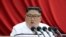 North Korean leader Kim Jong Un speaks during the 5th Plenary Meeting of the 7th Central Committee of the Workers' Party of Korea in this undated photo released on Dec. 30, 2019.