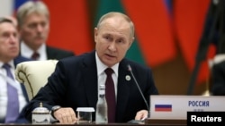 Russian President Vladimir Putin delivers a speech during an extended-format meeting of heads of the Shanghai Cooperation Organization (SCO) member states at a summit in Samarkand, Uzbekistan, Sept. 16, 2022. (Sputnik via Reuters)
