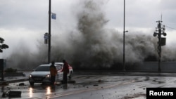A wave caused by Typhoon Hinnamnor hits the waterfront in Busan, South Korea, Sept. 6, 2022. (Yonhap/via Reuters)