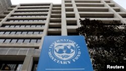 FILE - The International Monetary Fund headquarters building in Washington, April 8, 2019. 