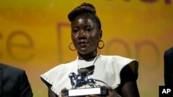 Director Alice Diop holds the Silver Lion Grand Jury Prize for "Saint Omar" at the 79th edition of the Venice Film Festival in Venice, Italy, Sept. 10, 2022.