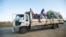 FILE - Displaced families from the community of Impire in the Cabo Delgado province travel on a flatbed truck as they flee on June 14, 2022, from armed insurgents who attacked their community two days earlier. 