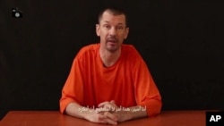 이슬람 극단주의 무장단체 ISIL에 인질로 붙잡혀 있는 영국인 사진기자 존 캔틀리.