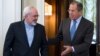 FILE - Iranian Foreign Minister Mohammad Javad Zarif, left, and Russian Foreign Minister Sergey Lavrov enter a hall for their talks in Moscow, Russia, Aug. 29, 2014.