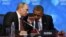 U.S. President Barack Obama (R) listens to Russia's President Vladimir Putin before the opening of the first plenary session of the G-20 Summit in Los Cabos, Mexico, June 18, 2012.