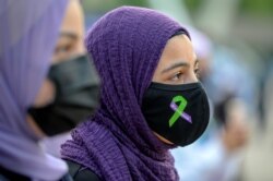 Masyarakat melakukan protes terhadapi Islamofobia, di Toronto, Ontario, Kanada 18 Juni, 2021. (Foto: REUTERS/Alex Filipe)