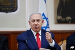 Israeli Prime Minister Benjamin Netanyahu chairs the weekly cabinet meeting in Jerusalem, April 14, 2019.