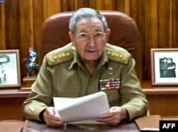 FILE - A screenshot from Cuban television shows President Raul Castro addressing the country, in Havana, Dec. 17, 2014.