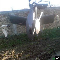 تباہ شدہ ہیلی کاپٹر کا ملبہ