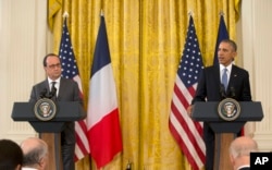 President Barack Obama and French President Francois Hollande participate in a news conference in the East Room of the White House in Washington, Tuesday, Nov. 24, 2015.