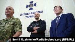UKRAINE – From left to right: Head of the Security Service of Ukraine Vasyl Hrytsak, journalist Arkady Babchenko and Prosecutor General of Ukraine Yuriy Lutsenko during the briefing of the SBU. Kyiv, May 30, 2018