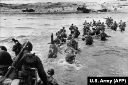 U.S. troops landing as reinforcements during the historic D-Day, June 6, 1944.