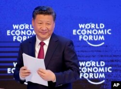 FILE - China's President Xi Jinping looks on at the World Economic Forum in Davos, Switzerland, Jan. 17, 2017.