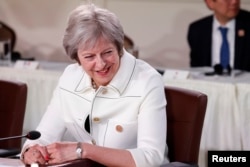 Britain's Prime Minister Theresa May is pictured during a portion of the G-7 summit in the Charlevoix city of La Malbaie, Quebec, Canada, June 9, 2018.
