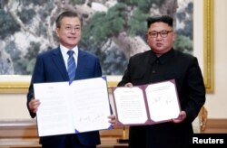 지난 2018년 9월 문재인 한국 대통령과 김정은 북한 국무위원장이 평양에서 평양공동선언문에 서명다. 사진 출처=평양사진공동취재단