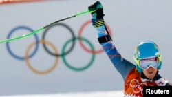 Winner Ted Ligety of the U.S. reacts after the second run of the men's alpine skiing giant slalom event in the Sochi 2014 Winter Olympics, Feb. 19, 2014.