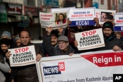 Kashmiris participate in a protest against the targeting of Kashmiri Muslims in Hindu-majority India, in Srinagar, Indian-controlled Kashmir, Feb. 22, 2019.