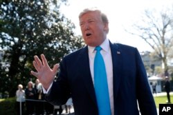 FILE - President Donald Trump speaks to members of the media on the South Lawn of the White House in Washington, before boarding Marine One helicopter, April 10, 2019.