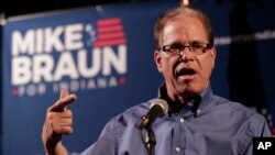 Republican Senate candidate Mike Braun thanks supporters after winning the Republican primary in Whitestown, Ind., May 8, 2018.