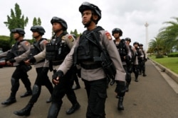 Polisi dan TNI akan dikerahkan untuk melakukan patroli saat pemberlakukan PSBB di Jakarta (foto: ilustrasi).