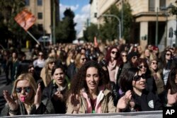Municipal kindergarten teachers demonstrate to express fears that their jobs will be lost in a planned overhaul of pre-school education, in Athens, Feb. 26, 2018.