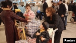 ქართველები მოსკოვის აეროპორტში დეპორტაციის მოლოდინში, 2006