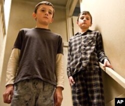 FRANKIE and GEORGE McLAREN as Marcus and Jason in Warner Bros. Pictures’ drama “HEREAFTER,” a Warner Bros. Pictures release.