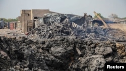 Part of a military ammunition depot in N'Djamena, Chad, lies in ruin on June 19, 2024, the morning after a fire caused explosions.