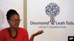 FILE - Reverend Mpho Tutu, the daughter of retired South African Archbishop Desmond Tutu, speaks to media during a press briefing in Cape Town, South Africa, Aug. 18, 2015. 