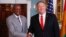 Secretary of State Mike Pompeo, right, shakes hands with Guinean President Alpha Conde at the State Department in Washington, Sept. 13, 2019.
