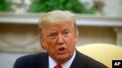 President Donald Trump speaks during a meeting with Greek Prime Minister Kyriakos Mitsotakis in the Oval Office of the White House, Jan. 7, 2020, in Washington. 