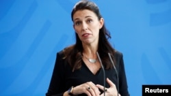 New Zealand Prime Minister Jacinda Ardern speaks during a press conference with German Chancellor Angela Merkel in Berlin, April 17, 2018. Ardern giver birth to her first child, a girl, Thursday in New Zealand.
