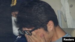 Takahiro Širaši u policijskom automobilu u Tokiju, na fotografiji agencije Kjodo snimljenoj 2017. godine. Fotografija je objavljena 15. decembra 2020. 