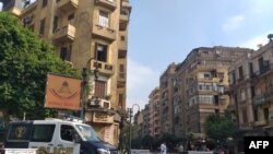 An Egyptian police van blocks a street leading to Cairo's Tahrir square, Sept. 27, 2019, in anticipation of anti-government protests.