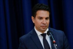 FILE - Alexandre Ramagem, general director of the Brazilian Intelligence Agency (ABIN), speaks during his inauguration ceremony, in Brasilia, Brazil, July 11, 2019.