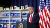 FILE - U.S. President Donald Trump speaks prior to signing executive orders on lowering drug prices in the Eisenhower Executive Office Building at the White House in Washington, July 24, 2020. 