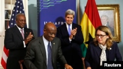 (L-R) Ghana President John Dramani Mahama, Ghana Finance Minister Seth Terkper, U.S. Secretary of State John Kerry and Dana Hyde, CEO of the Millennium Challenge Corporation (MCC), participate in the Ghana Compact Signing Ceremony at the State Department 