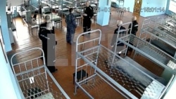 A still image from CCTV footage published by Life.Ru shows what is said to be jailed Kremlin critic Alexey Navalny speaking with a prison guard at the IK-2 corrective penal colony in the town of Pokrov, Russia, in this image released Apr. 2, 2021.
