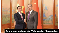 Hai vị ngoại trưởng Việt Nam-Trung Quốc gặp gỡ nhau tại Bắc Kinh hôm 10/12