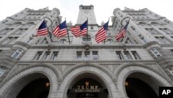 FILE - The front facade of Trump International Hotel at 1100 Pennsylvania Ave. NW, is seen in Washington, D.C., Dec. 21, 2016. Owners of a wine bar in the U.S. capital claim the hotel is unfairly hurting their business.
