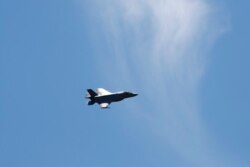 A F-35 Joint Strike Fighter aircraft performs a flyover above the White House in Washington, June 12, 2019.