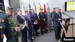 Colombian Defense Minister Guillermo Botero speaks during a news conference about Venezuela's President Nicolas Maduro's support for illegal Colombian armed groups operating from Venezuelan territory, in Bogota, Sept. 30, 2019. 