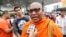 FILE - Loun Sovath, a monk activist, talks to VOA Khmer at a convenience store where Mr. Kem Ley was fatally shot, in Phnom Penh, on Sunday, July 9, 2016. (Leng Len/VOA Khmer)