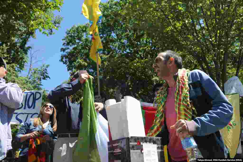 Protesters demonstrate outside the White House as Turkish President Recep Tayyip Erdogan meets with U.S. President Donald Trump, May 16, 2017.