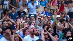 Soccer fans in New York react to a last minute goal that put Portugal even with United States at the end of their 2014 World Cup match.