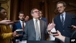 EPA administrator Andrew Wheeler speaks with the media at the Environmental Protection Agency, June 19, 2019, in Washington. 
