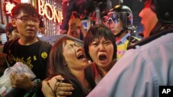 Hong Kong Police Arrest Protest Leaders, Clear Streets