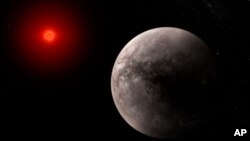This illustration provided by the European Space Agency depicts what the exoplanet TRAPPIST-1 b could look like. (NASA, ESA, CSA, J. Olmsted (STScI), T. P. Greene (NASA Ames), T. Bell (BAERI), E. Ducrot (CEA), P. Lagage (CEA) via AP)