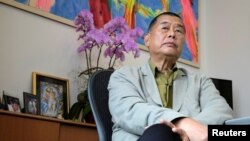 FILE - Media mogul Jimmy Lai Chee-ying, founder of Apple Daily speaks during an interview to response national security legislation in Hong Kong, China, May 29, 2020. 